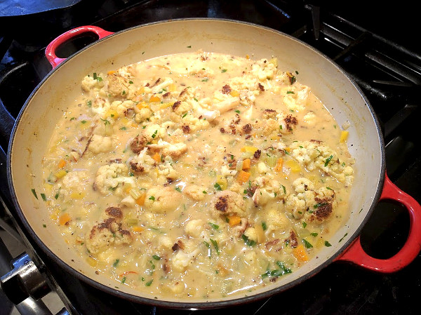 Roasted cauliflower soup simmering