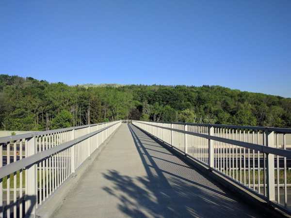 Running across the Chedoke Rail Trail Highway 403 overpass