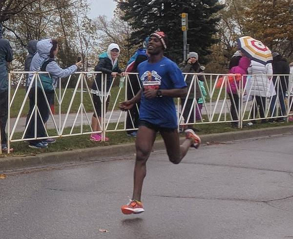 Road2Hope 2017 Marathon first place finisher Bonsa Gonfa just before the finish line